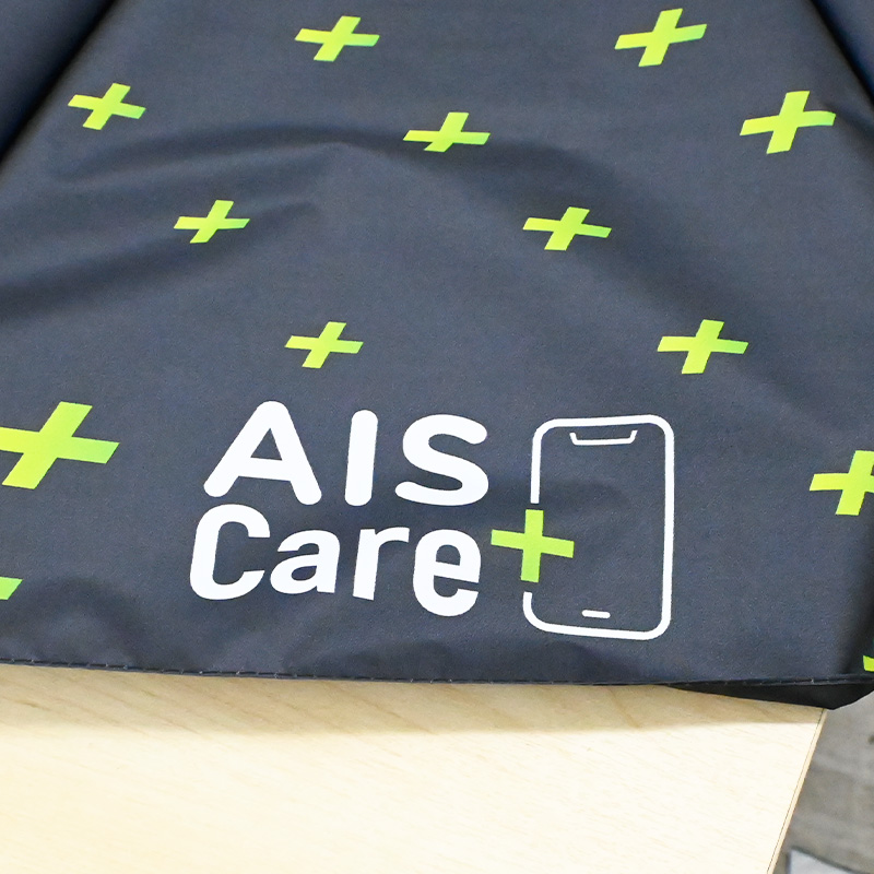 ร่มสกรีนโลโก้-AIS (2) ผลงานร่มพับ-พิมพ์โลโก้-AIS Care